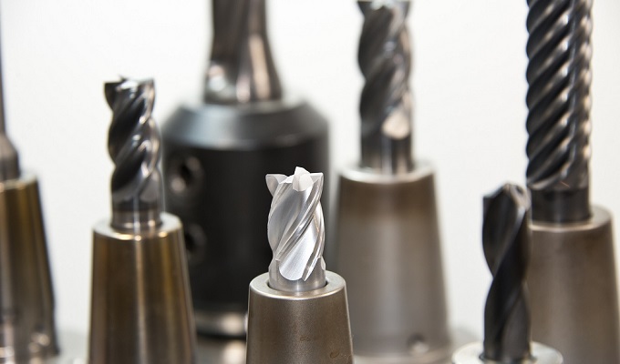 What are the characteristics of cemented carbide tools?